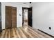 Bedroom with access to another room and wood floors at 4822 3Rd S Ave, St Petersburg, FL 33711