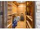 Storage room with wood shelving and ample space at 4822 3Rd S Ave, St Petersburg, FL 33711