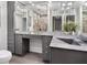 Modern bathroom with a floating vanity and large mirrors at 4822 3Rd S Ave, St Petersburg, FL 33711