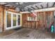 Rustic outdoor bar area with wooden walls and a covered deck at 4822 3Rd S Ave, St Petersburg, FL 33711