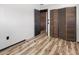 Bright bedroom with wood floors and built-in closet at 4822 3Rd S Ave, St Petersburg, FL 33711