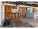 Rustic outdoor bar area with wooden walls and a covered deck at 4822 3Rd S Ave, St Petersburg, FL 33711