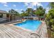 Inviting pool and spacious wooden deck at 4822 3Rd S Ave, St Petersburg, FL 33711