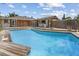 Refreshing pool with a large wooden deck at 4822 3Rd S Ave, St Petersburg, FL 33711
