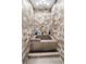 Modern bathroom with a built-in soaking tub and stone tile at 4822 3Rd S Ave, St Petersburg, FL 33711