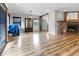 Bright living room with hardwood floors and exposed brick fireplace at 4822 3Rd S Ave, St Petersburg, FL 33711