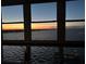 Sunroom with breathtaking sunset views at 7200 Sunshine Skyway S Ln # 7E, St Petersburg, FL 33711
