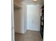 Small closet with wood laminate flooring at 7200 Sunshine Skyway S Ln # 7E, St Petersburg, FL 33711