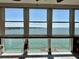 Sunroom with expansive waterfront views at 7200 Sunshine Skyway S Ln # 7E, St Petersburg, FL 33711