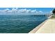 Private waterfront deck with access to the water and scenic views at 7200 Sunshine Skyway S Ln # 7E, St Petersburg, FL 33711