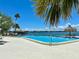 Community pool with waterfront views at 7200 Sunshine Skyway S Ln # 7E, St Petersburg, FL 33711