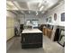 Community storage room with lockers and extra space at 7200 Sunshine Skyway S Ln # 7E, St Petersburg, FL 33711