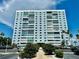 High rise building exterior with ample parking at 7200 Sunshine Skyway S Ln # 7E, St Petersburg, FL 33711
