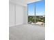 Bright bedroom with city view and grey carpet at 777 3Rd N Ave # 1204, St Petersburg, FL 33701