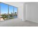 Bright bedroom with city view and grey carpet at 777 3Rd N Ave # 1204, St Petersburg, FL 33701