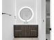 Modern bathroom with sleek vanity and round mirror at 777 3Rd N Ave # 1204, St Petersburg, FL 33701