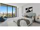 Modern bedroom with city views and comfortable bedding at 777 3Rd N Ave # 1204, St Petersburg, FL 33701