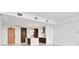 Modern kitchen with island and wood cabinetry at 777 3Rd N Ave # 1204, St Petersburg, FL 33701