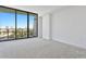 Bedroom with floor to ceiling windows and balcony access at 777 3Rd N Ave # 1204, St Petersburg, FL 33701