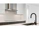 Modern kitchen details, featuring stainless steel appliances and a black faucet at 777 3Rd N Ave # 1204, St Petersburg, FL 33701