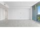 Open concept living area with large windows and city views at 777 3Rd N Ave # 1204, St Petersburg, FL 33701