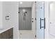 Walk-in shower with gray tile and rainfall shower heads at 777 3Rd N Ave # 1204, St Petersburg, FL 33701