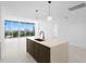 Modern kitchen with an island and city views at 777 3Rd N Ave # 1204, St Petersburg, FL 33701