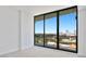 Bedroom with sliding glass doors to balcony and city view at 777 3Rd N Ave # 1204, St Petersburg, FL 33701