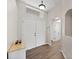 Bright and airy entryway with hardwood floors and double doors at 2193 Peake St, North Port, FL 34286
