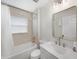 Updated bathroom with a tub, shower, and modern vanity at 2193 Peake St, North Port, FL 34286