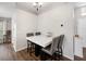 Dining area with a marble table and four gray chairs at 2193 Peake St, North Port, FL 34286
