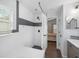 Modern bathroom with walk-in shower and access to bedroom at 2193 Peake St, North Port, FL 34286