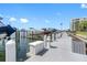 Scenic waterfront view from the private dock, complete with boat slips and a nearby condominium building at 660 Island Way # 401, Clearwater, FL 33767