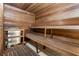 The home offers a wood sauna room, perfect for relaxation and wellness featuring wood benches and flooring at 660 Island Way # 401, Clearwater, FL 33767