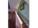Staircase with dark carpeting and decorative wall art at 7607 55Th E St, Ellenton, FL 34222