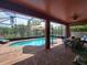 Relaxing pool and patio area with seating and outdoor dining space at 7607 55Th E St, Ellenton, FL 34222