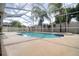 Inviting screened pool and spa with ample deck space at 12408 Seabrook Dr, Tampa, FL 33626