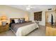 King-size bed, ceiling fan, and ample space at 660 Island Way # 401, Clearwater, FL 33767