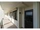 Building hallway with access to condo unit at 9415 Blind Pass Rd # 803, St Pete Beach, FL 33706