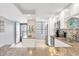 Bright kitchen features granite counters, stainless steel appliances, and white cabinets at 9415 Blind Pass Rd # 803, St Pete Beach, FL 33706