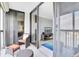 Private balcony with wicker furniture and scenic water views at 9415 Blind Pass Rd # 803, St Pete Beach, FL 33706