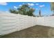 Private patio area with a white vinyl fence at 3247 38Th S Way # C, St Petersburg, FL 33711