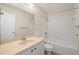 Clean bathroom with tub, toilet, and vanity at 3247 38Th S Way # C, St Petersburg, FL 33711