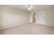 Large bedroom with ceiling fan and access to bathroom at 3247 38Th S Way # C, St Petersburg, FL 33711