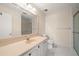 Bathroom with single vanity, toilet, and shower at 3247 38Th S Way # C, St Petersburg, FL 33711