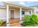 One story home with a front porch at 651 Jungle Queen Way, Longboat Key, FL 34228