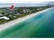 Aerial view of property near the beach and ocean at 651 Jungle Queen Way, Longboat Key, FL 34228