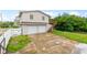 Two-car garage, elevated deck, and waterfront views at 651 Jungle Queen Way, Longboat Key, FL 34228