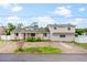 Two story home with a spacious yard at 651 Jungle Queen Way, Longboat Key, FL 34228