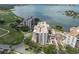 Stunning aerial view of the condo community, golf course, and waterfront at 6 Belleview Blvd # 706, Belleair, FL 33756